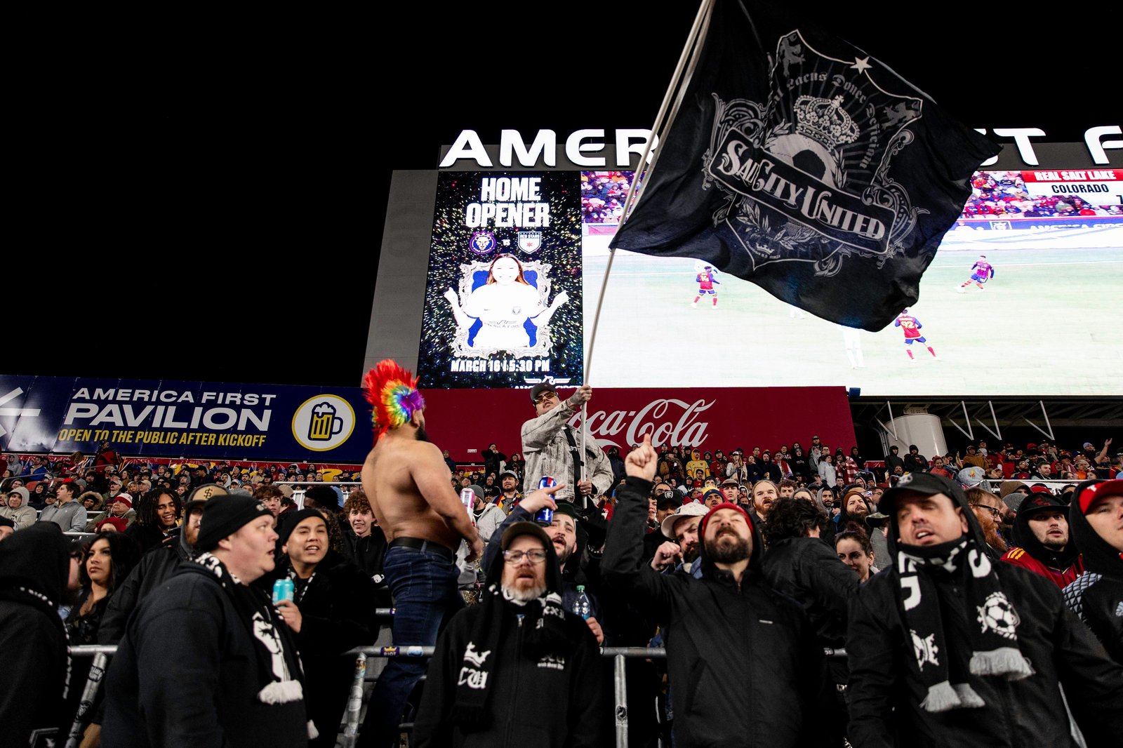 Luis waving the SCU flag